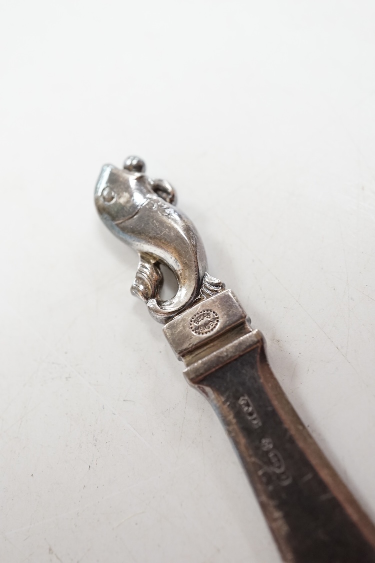 A 1960's Georg Jensen silver paperknife, design no.198, 11.5cm, with dolphin finial.
